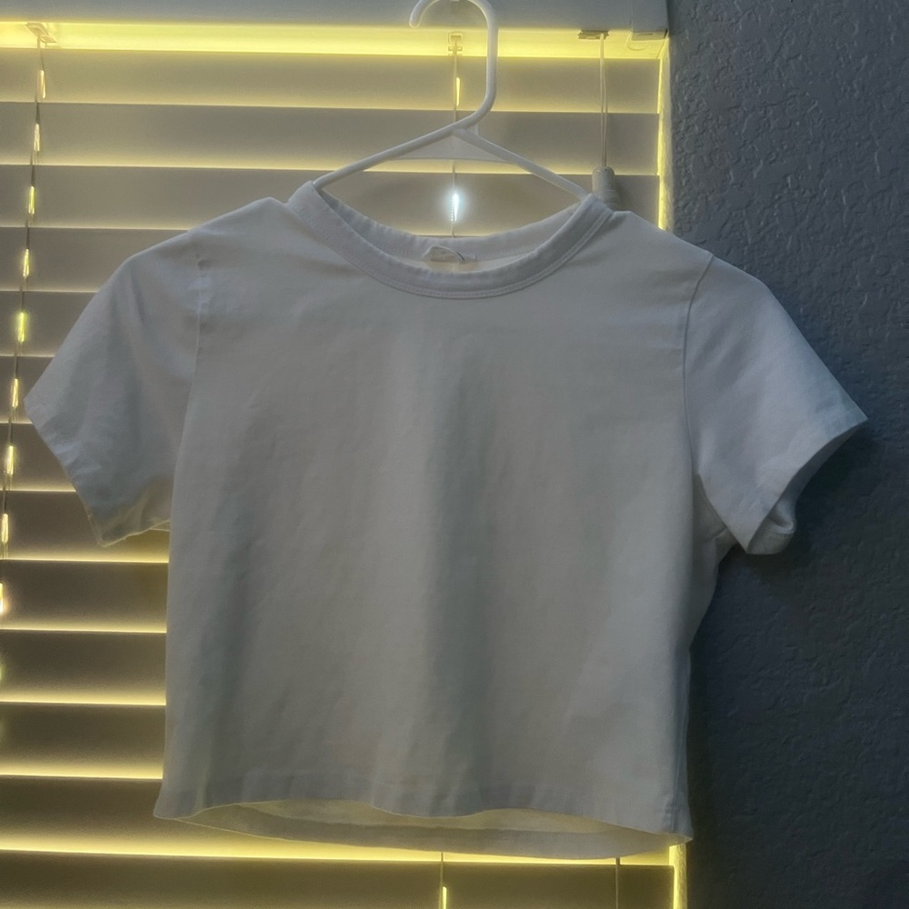 white baby tee, cropped and tight fit, size M
